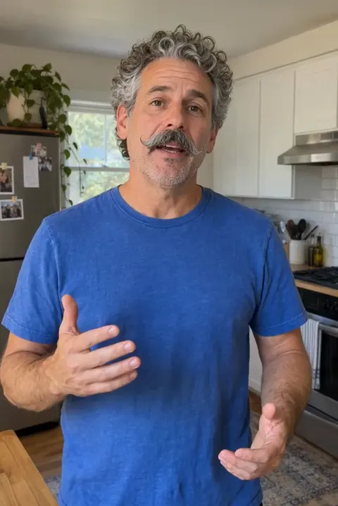 Actual Aisma result: The same explanation performed by a fictional man about 55 with gray curls.